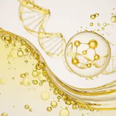 Złoty płyn z pęcherzykami i strukturą DNA. W centrum molekuła peptyd miedziowy w kuli.